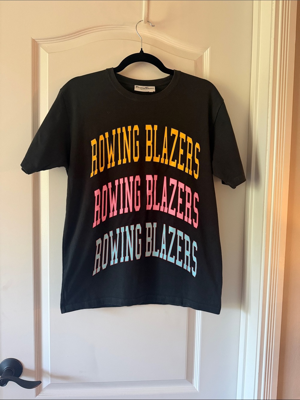 Rowing Blazers Black Tee with Yellow, Pink & Light Blue Logo